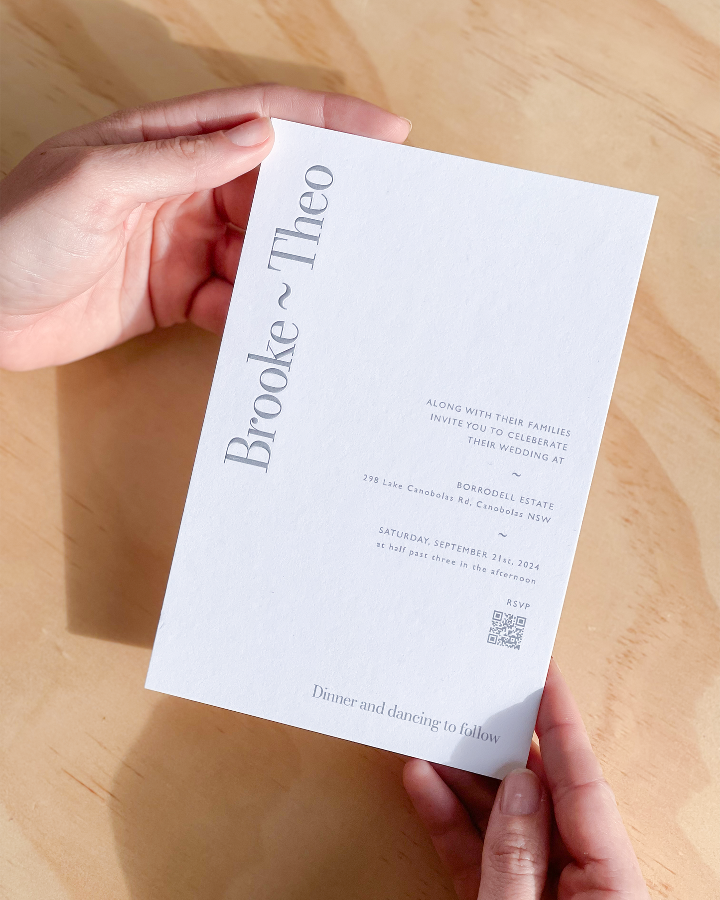 Brooklyn Wedding Invitation showing embossed guests names and print quality. A design by Communique Design.