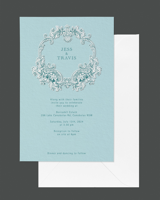 Travis wedding invitation — classic elegant wreath emboss design by Communique Design