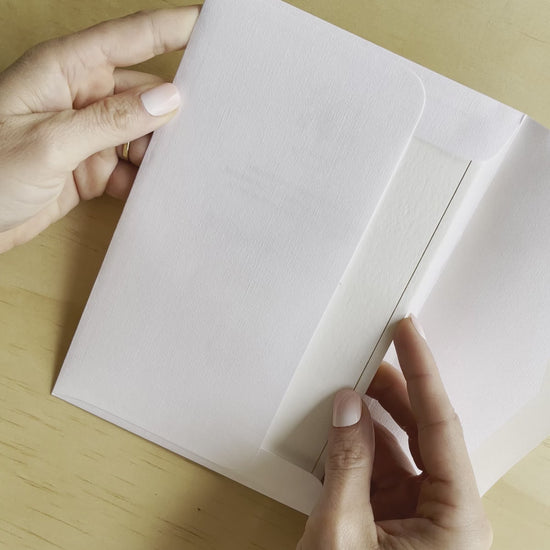Video reveal of the Sorrento wedding invitation with gold foil. A classic design from Communique Design.