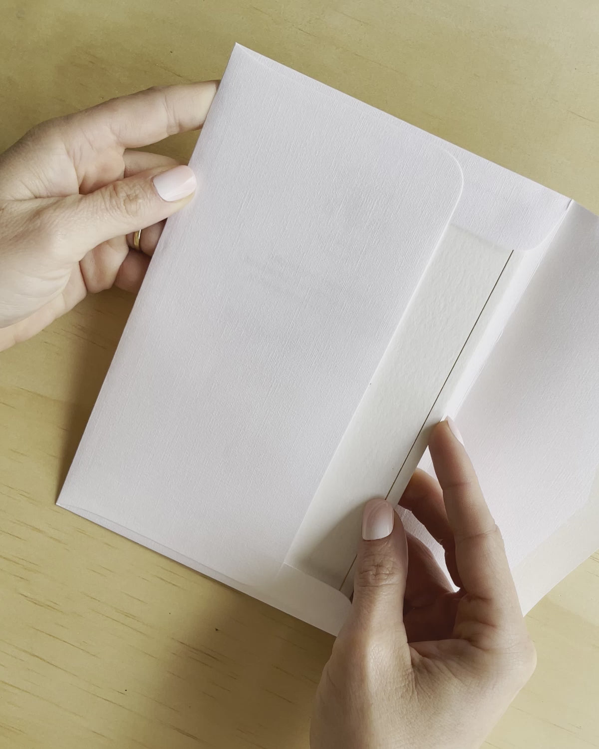 Video reveal of the Sorrento wedding invitation with gold foil. A classic design from Communique Design.